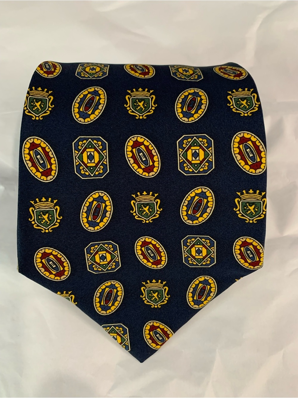 Vintage Tommy Hilfiger 100% Silk Necktie Featuring Medallions & crest’s Italy